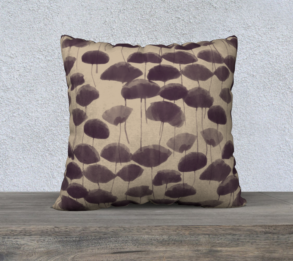Decorative pillow with purple ginkgo pattern on a neutral background