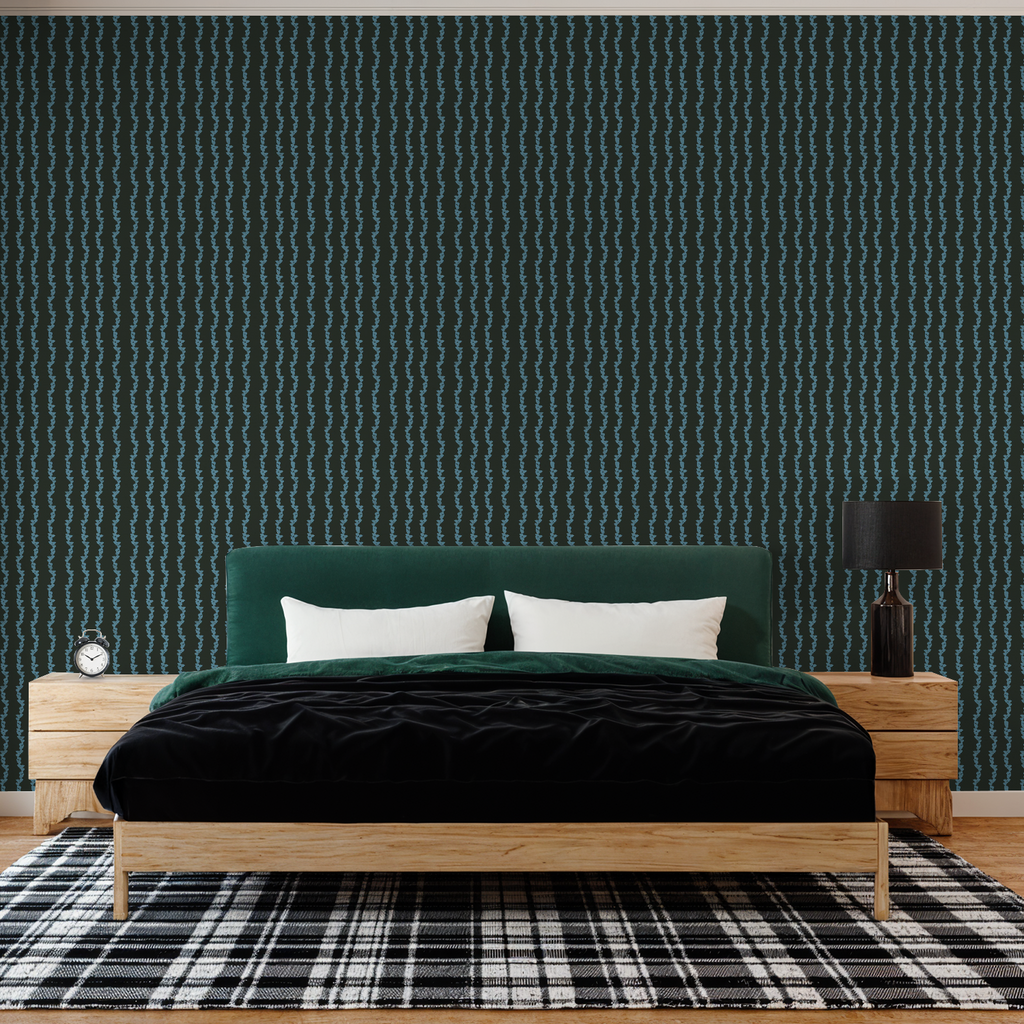 Bedroom with a green headboard, black bedding, wooden nightstands, and plaid rug.